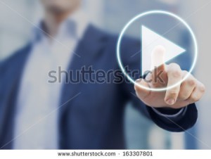 stock-photo-businessman-pressing-play-button-to-start-or-initiate-projects-163307801